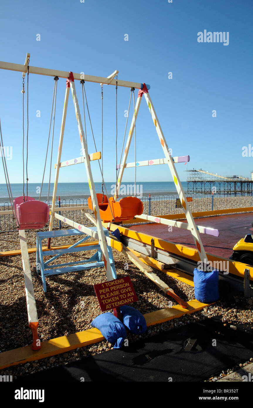 Children's swings on seafront at Bognor regis West Sussex England UK Stock Photo