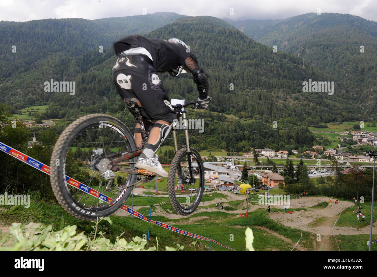 In the mountains of the Dolomites in Italy. Mountainbike downhill competition at the ski lift station of Commezzadura. Stock Photo