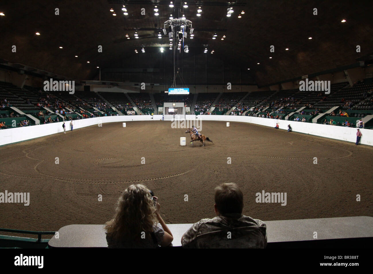A couple watching a rodeo event at the Minnesota State Fair Stock Photo