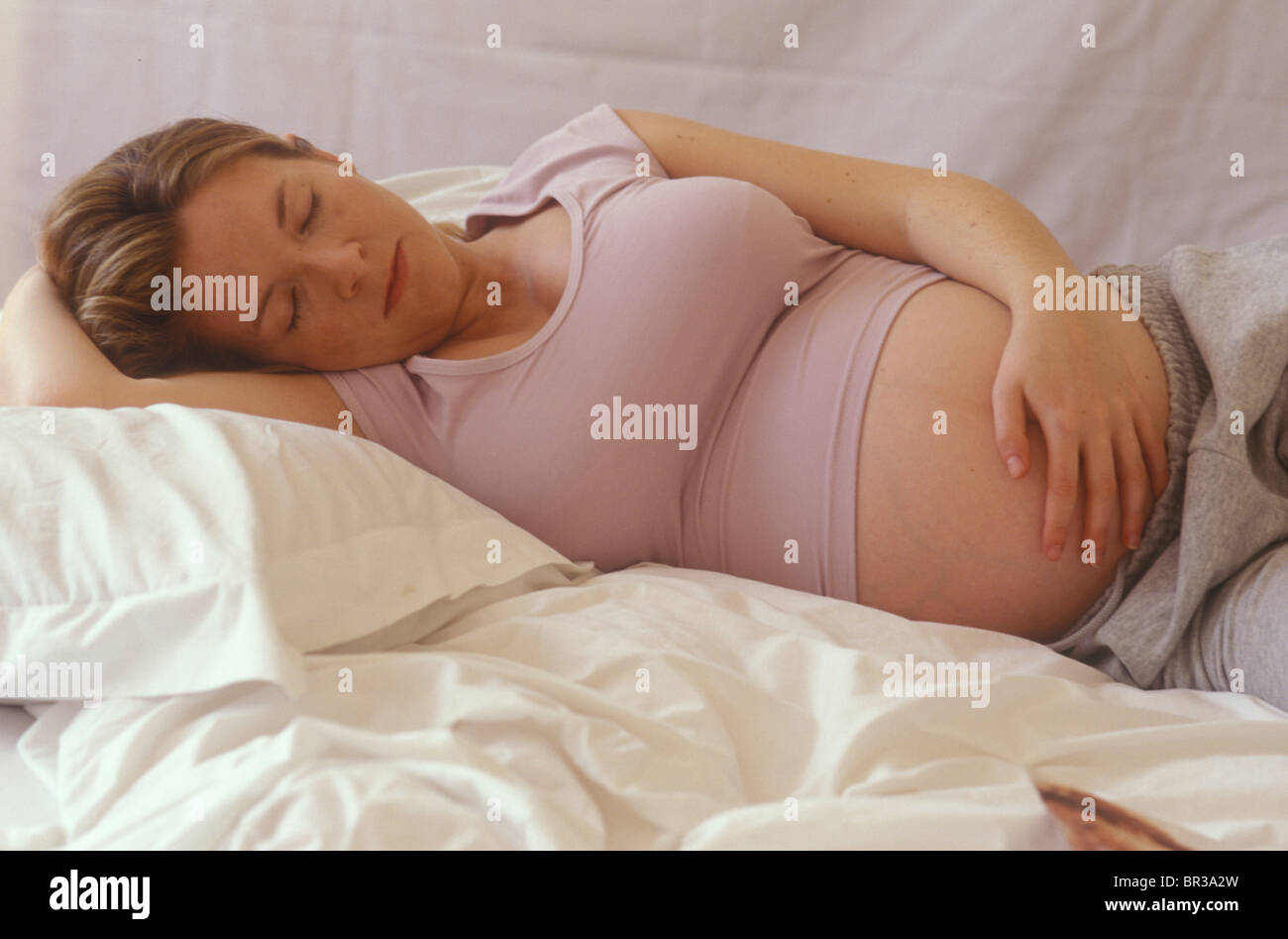 pregnant woman resting and looking serene Stock Photo