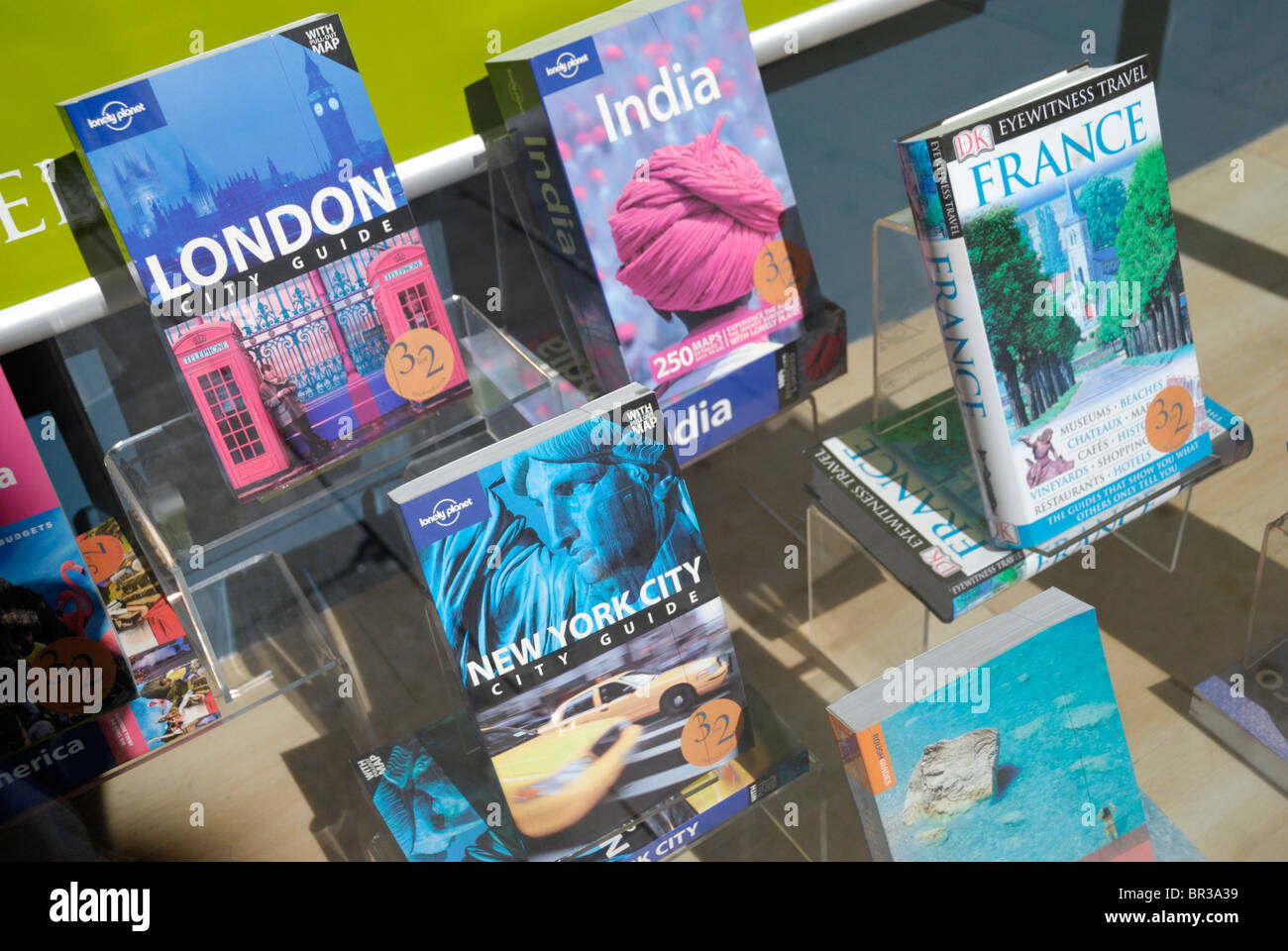 Travel guides on display in a shop window Stock Photo