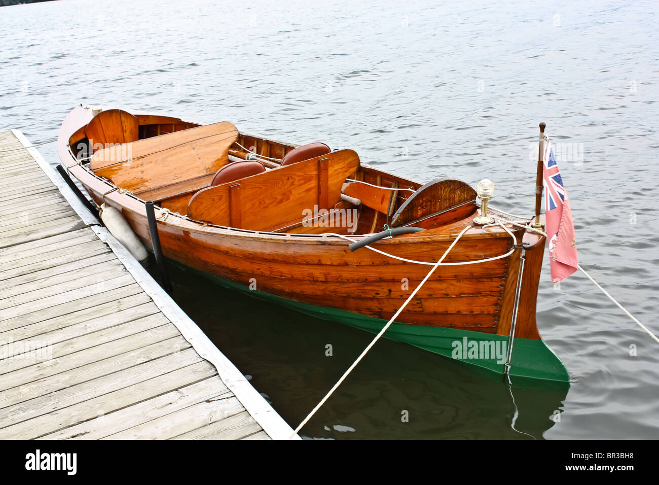 boat boats canoe canoes park water deck cottage Stock Photo