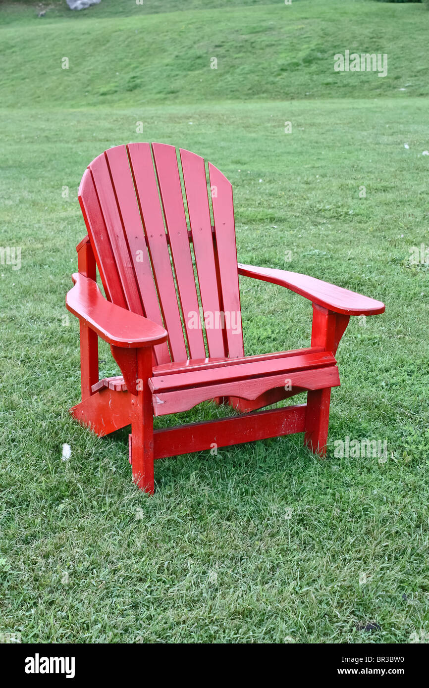 red wooden lawn chair outdoor green grass Stock Photo Alamy