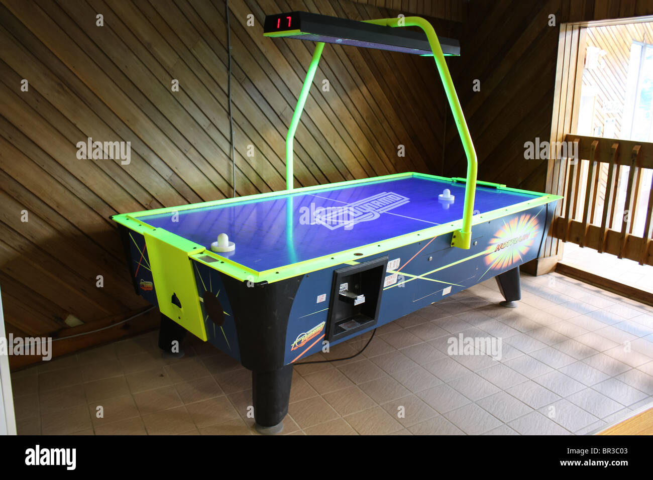 air hockey table hotel game room Stock Photo