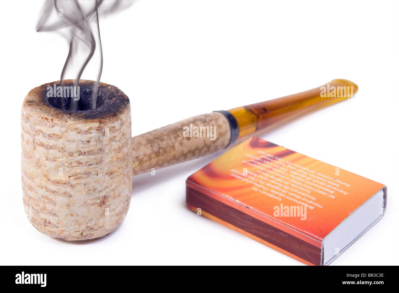 Tobacco pipe with safety matches Stock Photo