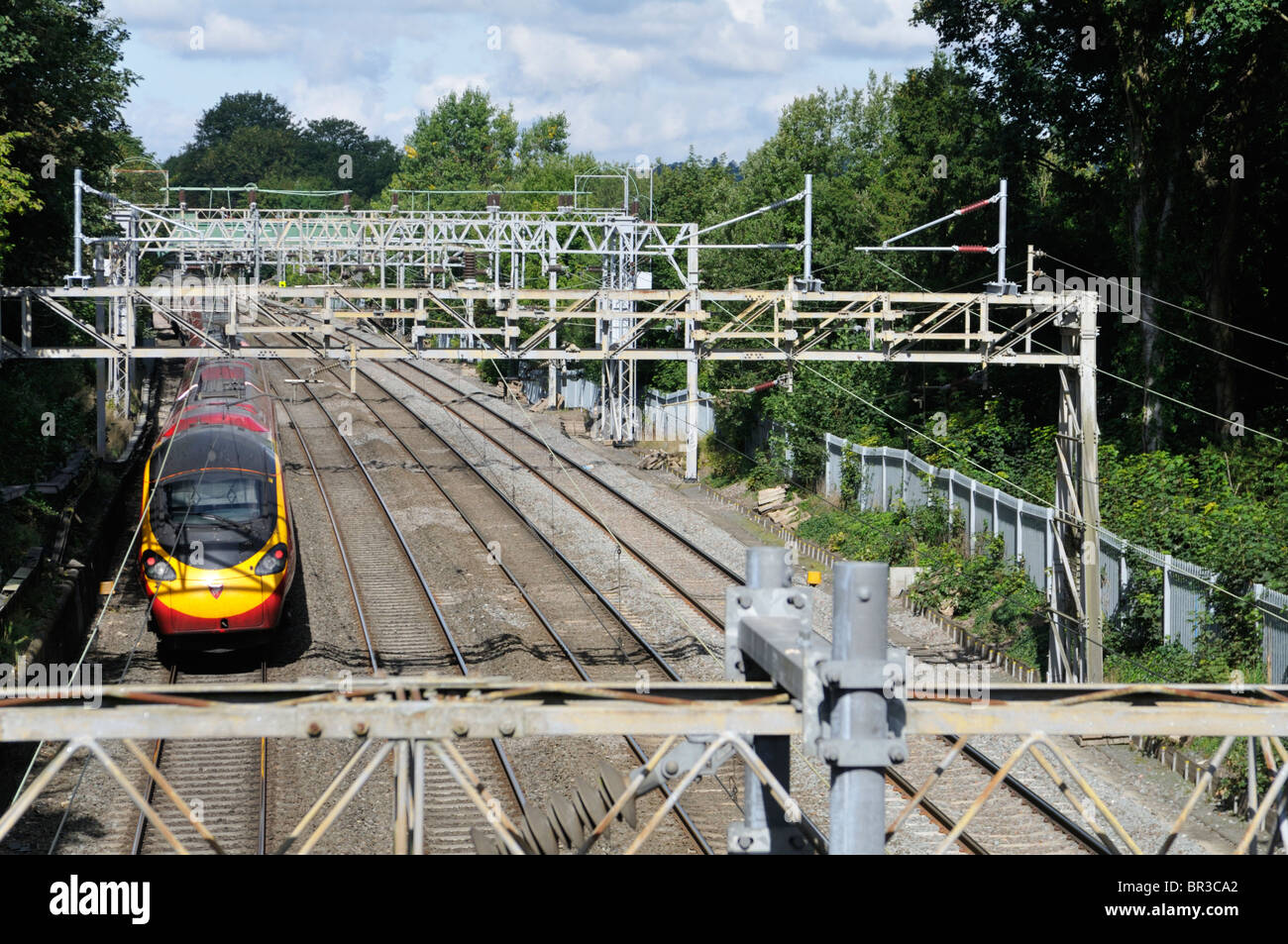 Virgin Pendolino train heading south toward London Euston, UK. Stock Photo