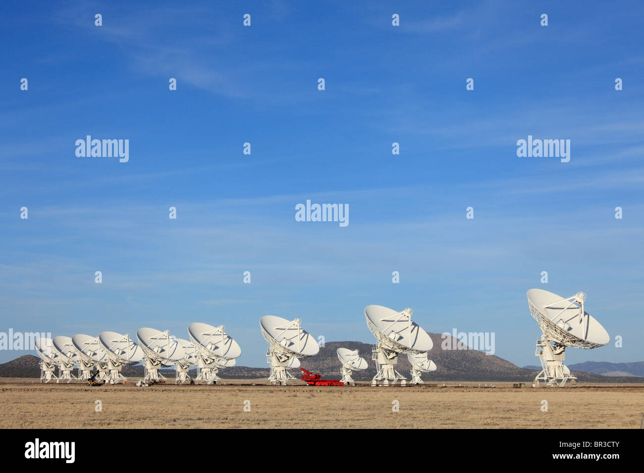Radio telescope dishes in the Very Large Array, New Mexico, are arranged in the 'D' configuration. Stock Photo