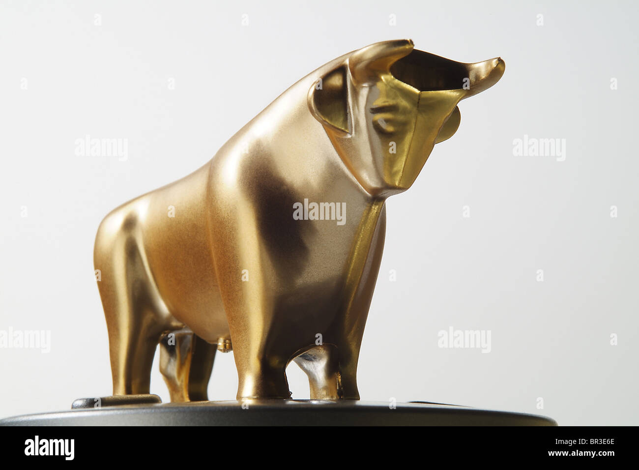 Golden bull figurine Stock Photo