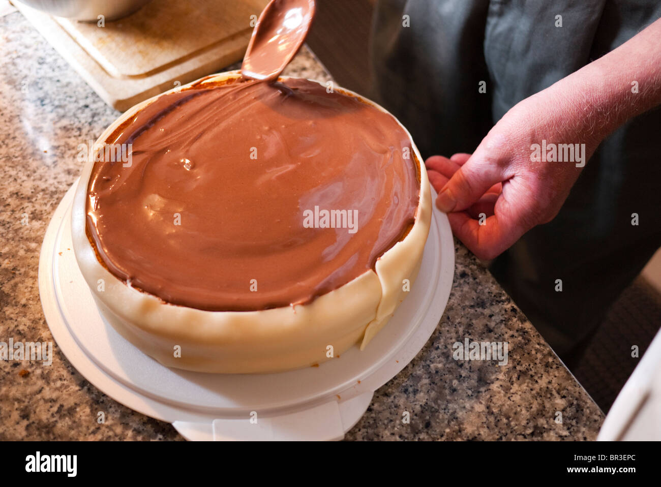 Chef making a birthday cake Stock Photo
