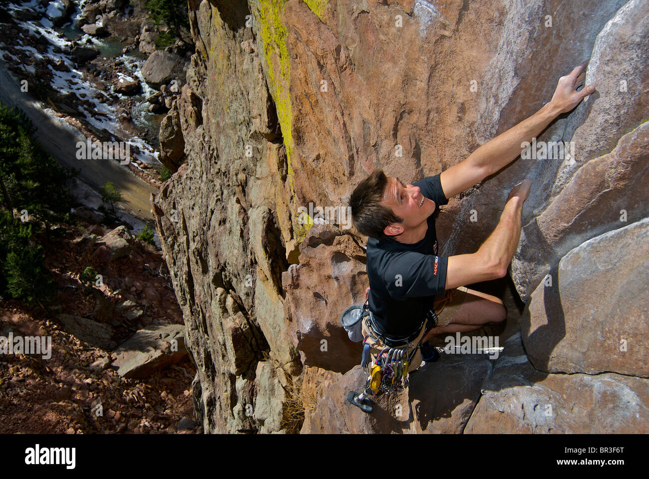 An amputee climber on a rock face in Eldorado Canyon, Colorado. Stock Photo