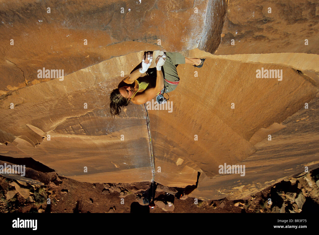 A woman rock climbing in Indian Creek, Utah. Stock Photo