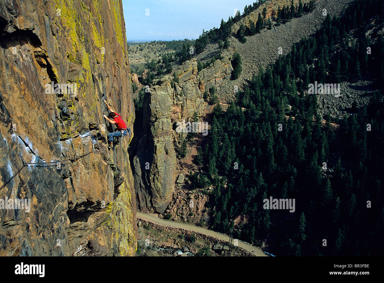 A man rock climbing in Eldorado Canyon, Colorado. Stock Photo