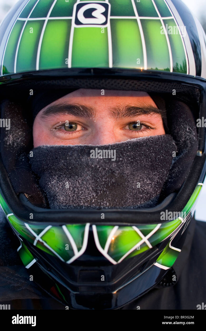 Portrait of a man snowmobiling in Maine. (close-up) Stock Photo