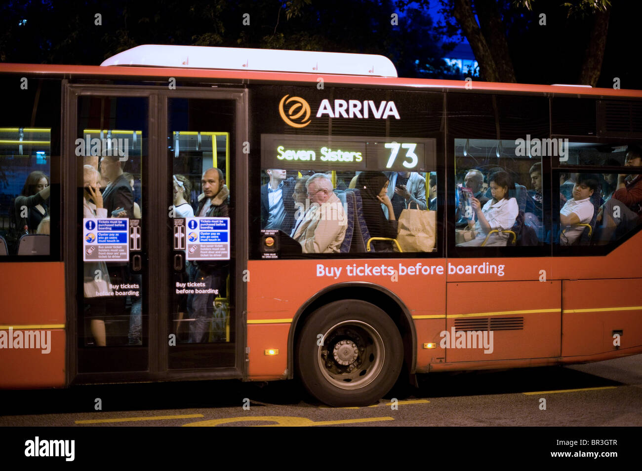 Packed commuters on bus during tube strike Stock Photo