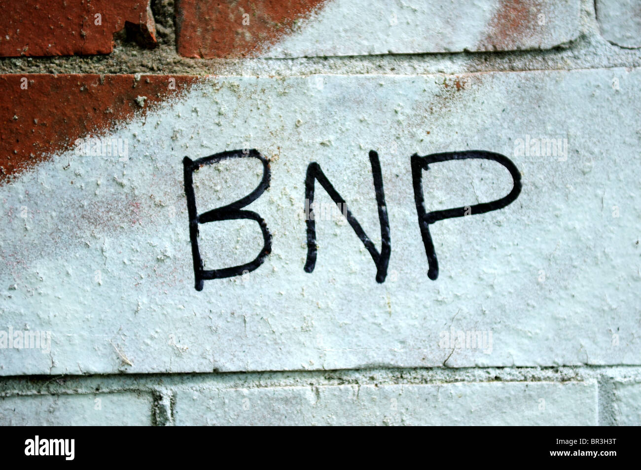 BNP ''British National Party'' Graffiti Painted on to Brick wall. Stock Photo