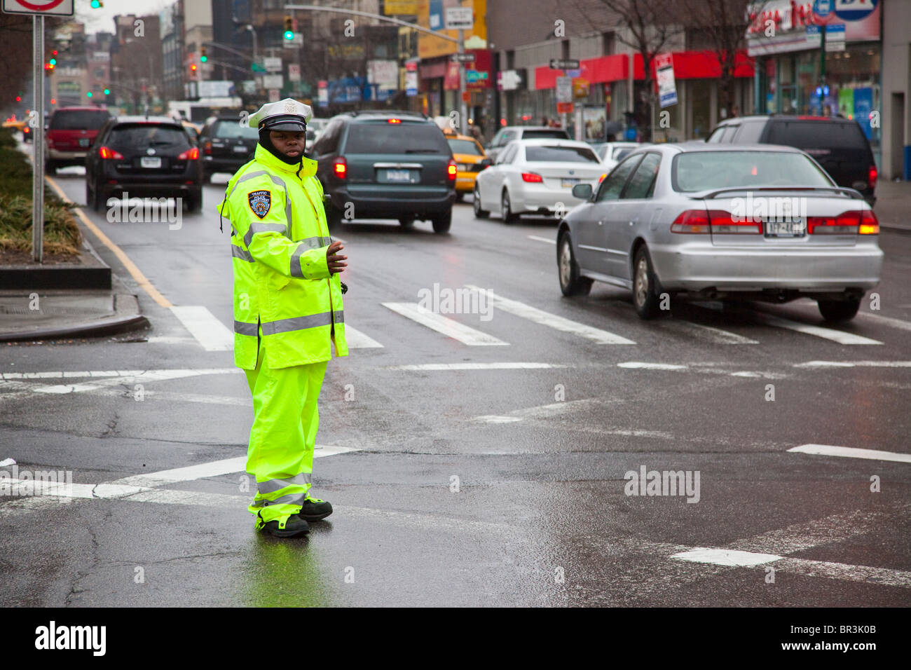 Traffic Policeman directing cars in Manhattan, New York Stock Photo