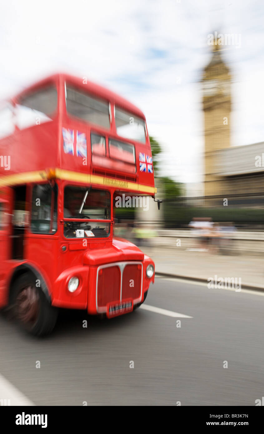 Routemaster bus passing Big Ben, London Stock Photo