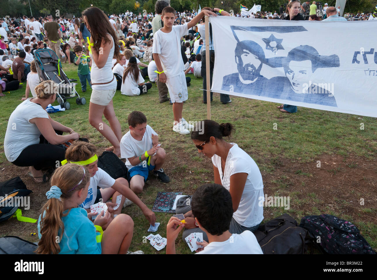 group of people seating in public park during demonstration for Gilad Shalit. Jerusalem Stock Photo