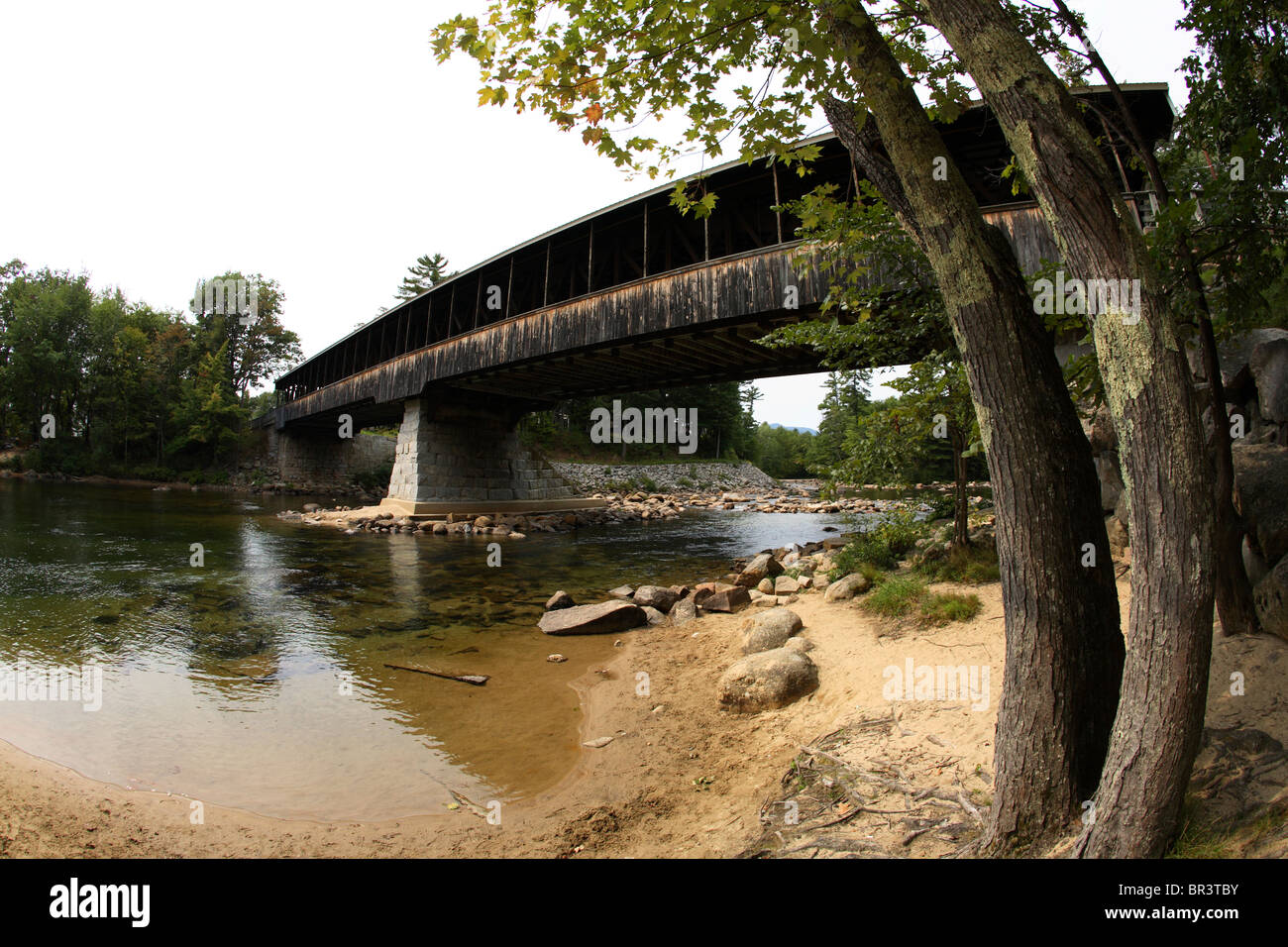 The Conway covered bridge over the Saco River in Conway, NH Stock Photo ...