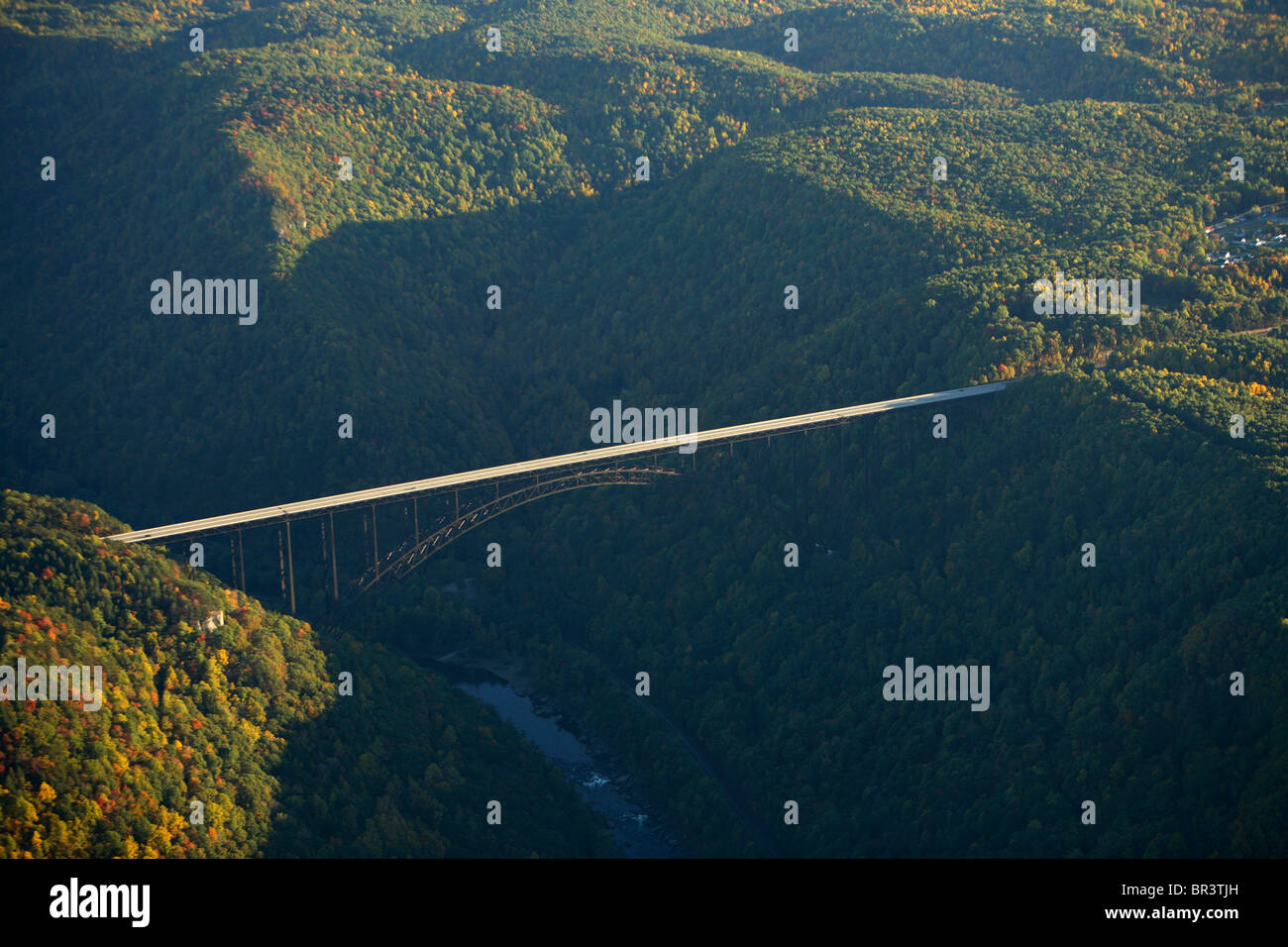 Aerial view of the Rt 19 bridge over the New River Gorge at sunset with fall colors near Fayetteville, WV Stock Photo