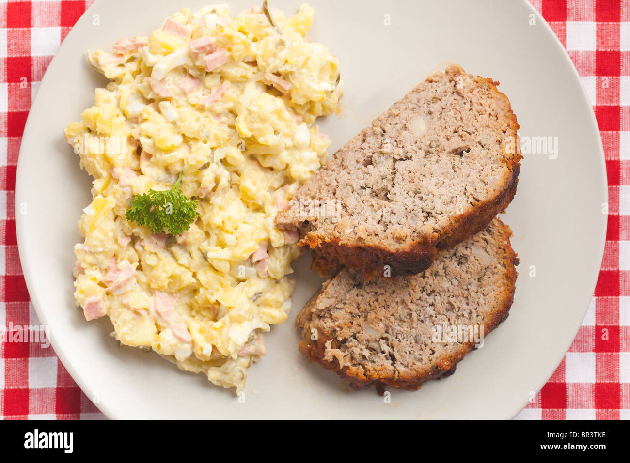 baked meatloaf with potato salad Stock Photo Alamy