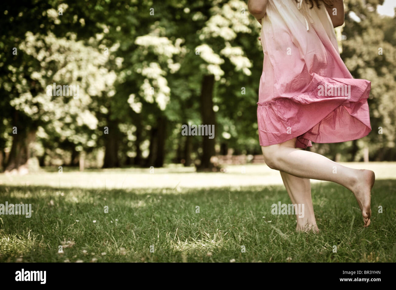 running barefoot on grass