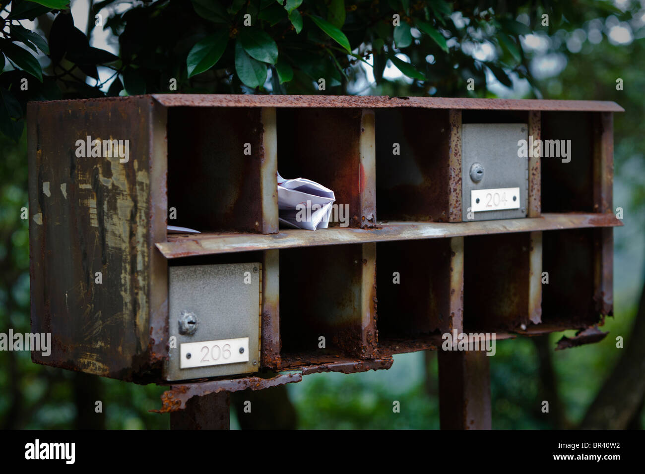 Old and rusted letter boxes on the Shek O Road in Hong Kong Stock Photo