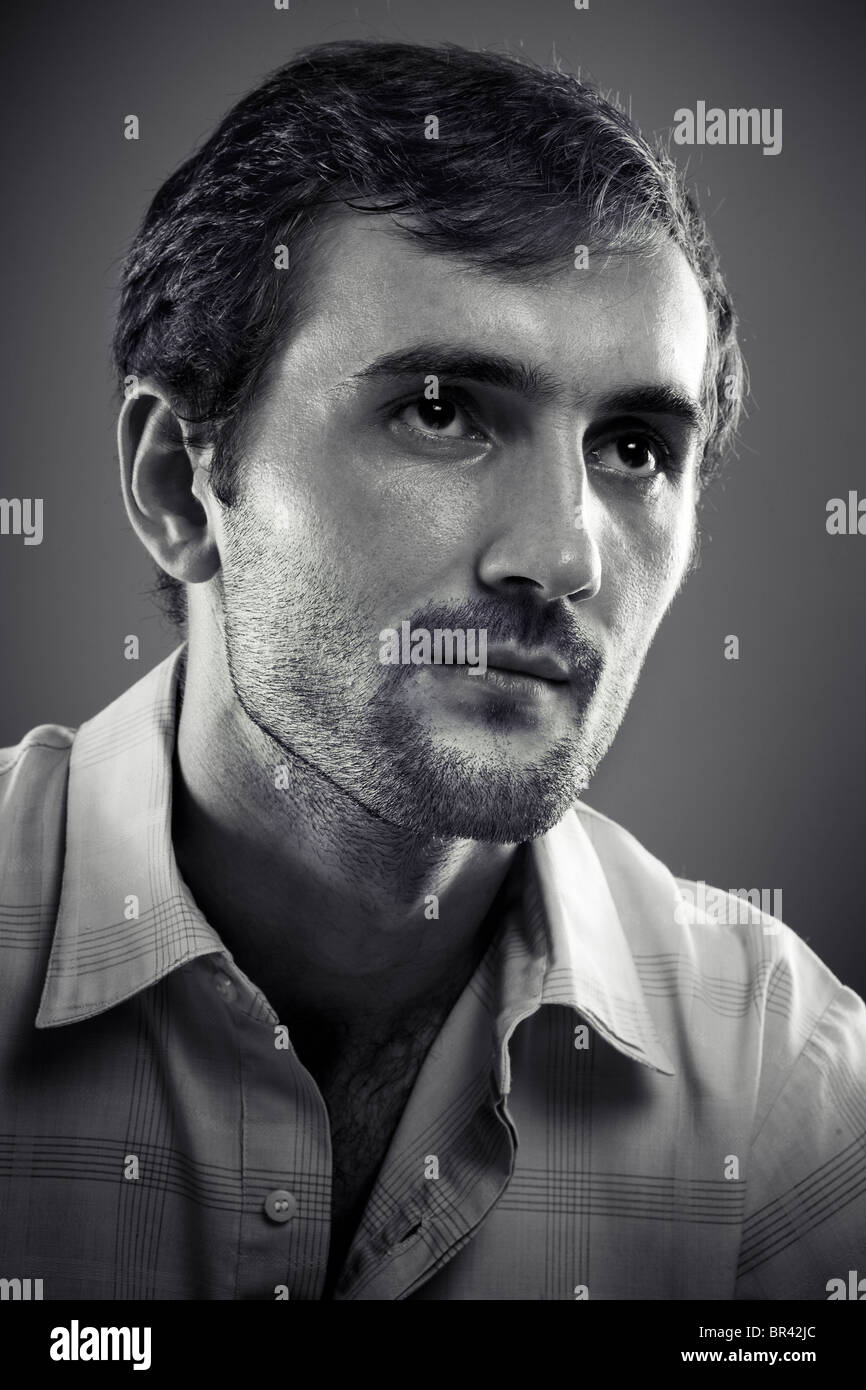 Close up portrait of a young man studio shot Stock Photo - Alamy