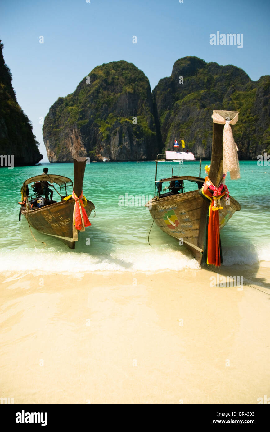 Longtail boats on the beach, Ko Phi Phi, Thailand Stock Photo