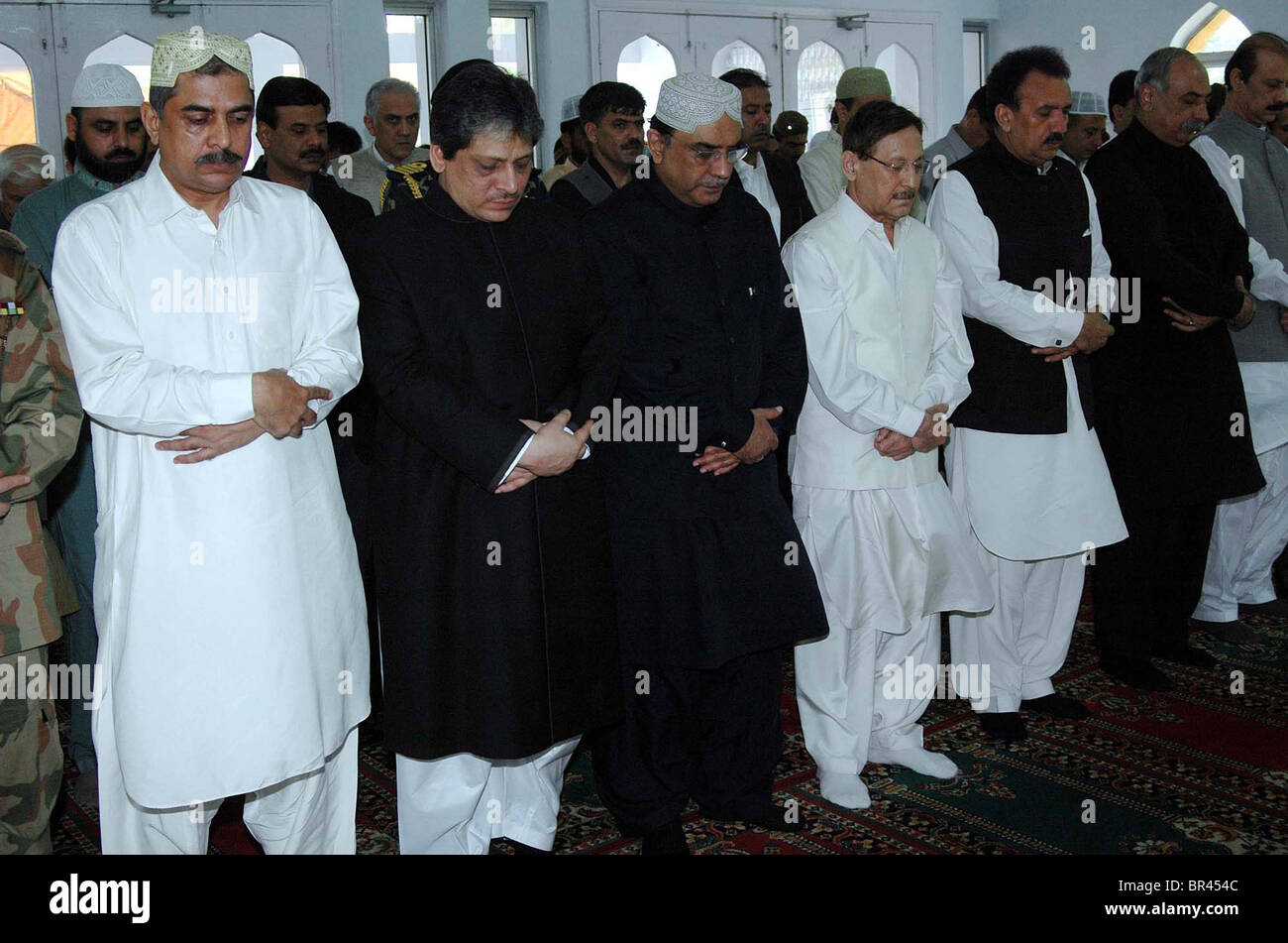 President, Asif Ali Zardari along with other offers Eid-ul-Fitar prayer at Governor House in Karachi Stock Photo
