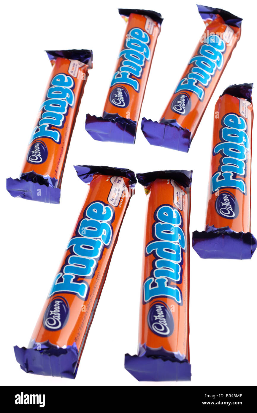 Six individually wrapped Cadbury's fudge chocolate bars Stock Photo