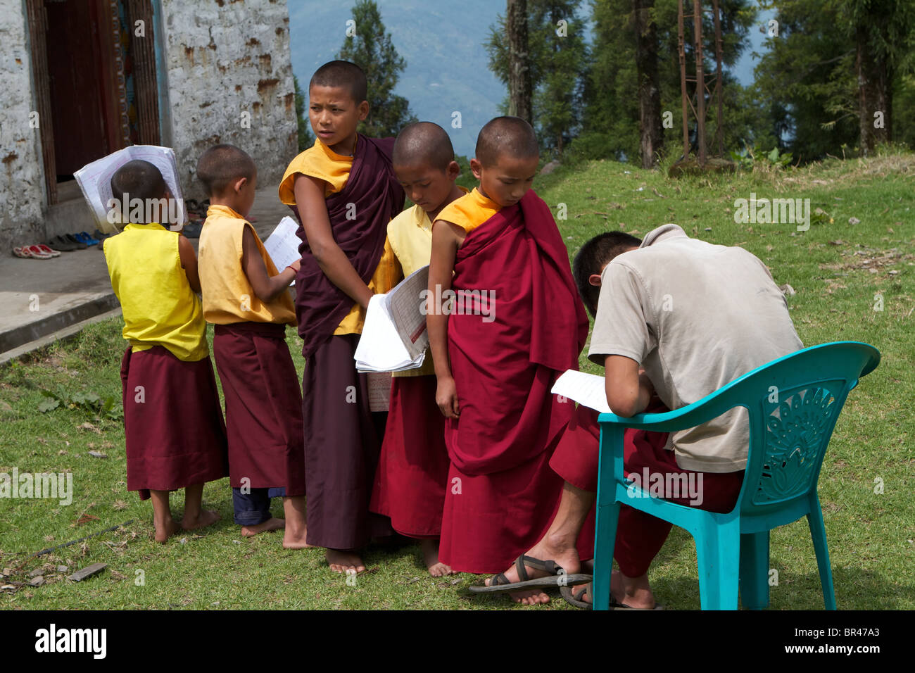 novice monks at an outdoor school Stock Photo