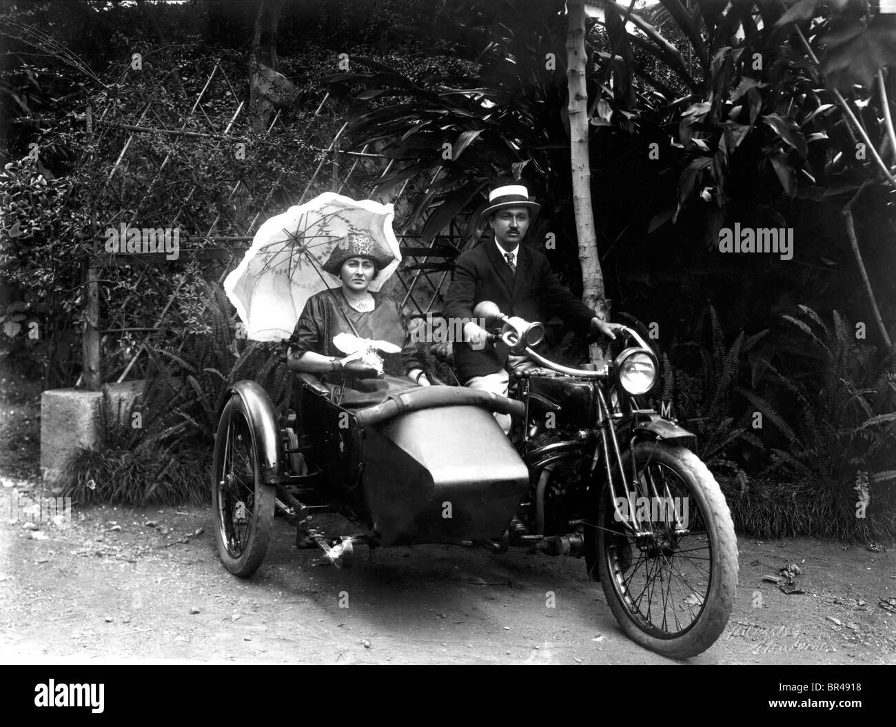 Historical image, couple on a motorcycle with sidecar, ca. 1921 Stock Photo