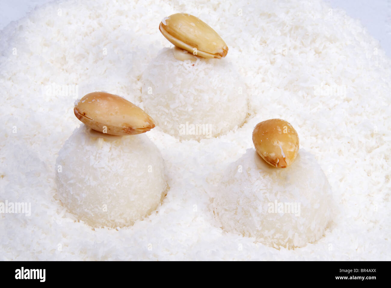 coconut balls with nuts Stock Photo Alamy