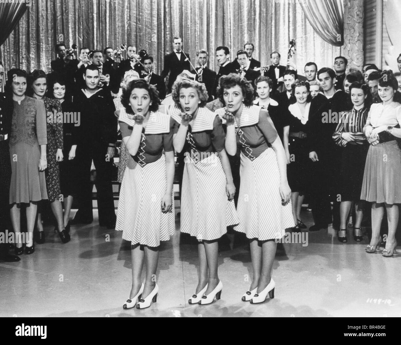 ANDREWS SISTERS  US vocal trio in unidentified film. From left: Maxine, Patty, LaVerne Stock Photo