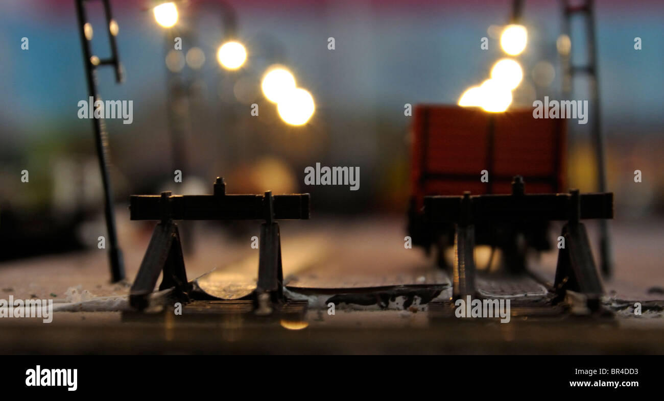 Model railway at night. Stock Photo