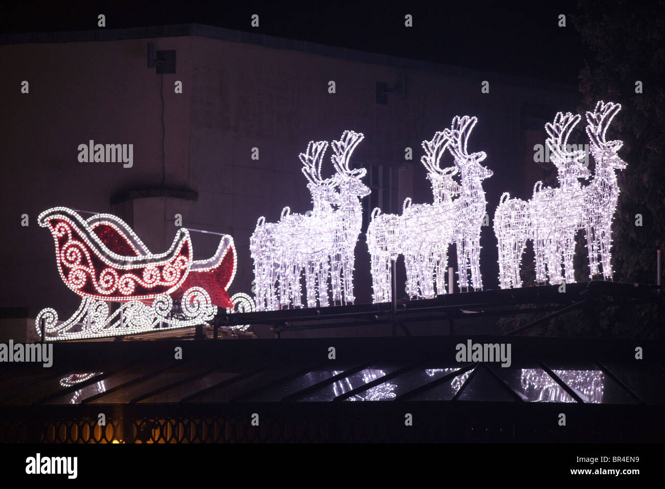 Outdoor christmas lights showing santa's sleigh and reindeer. Stock Photo
