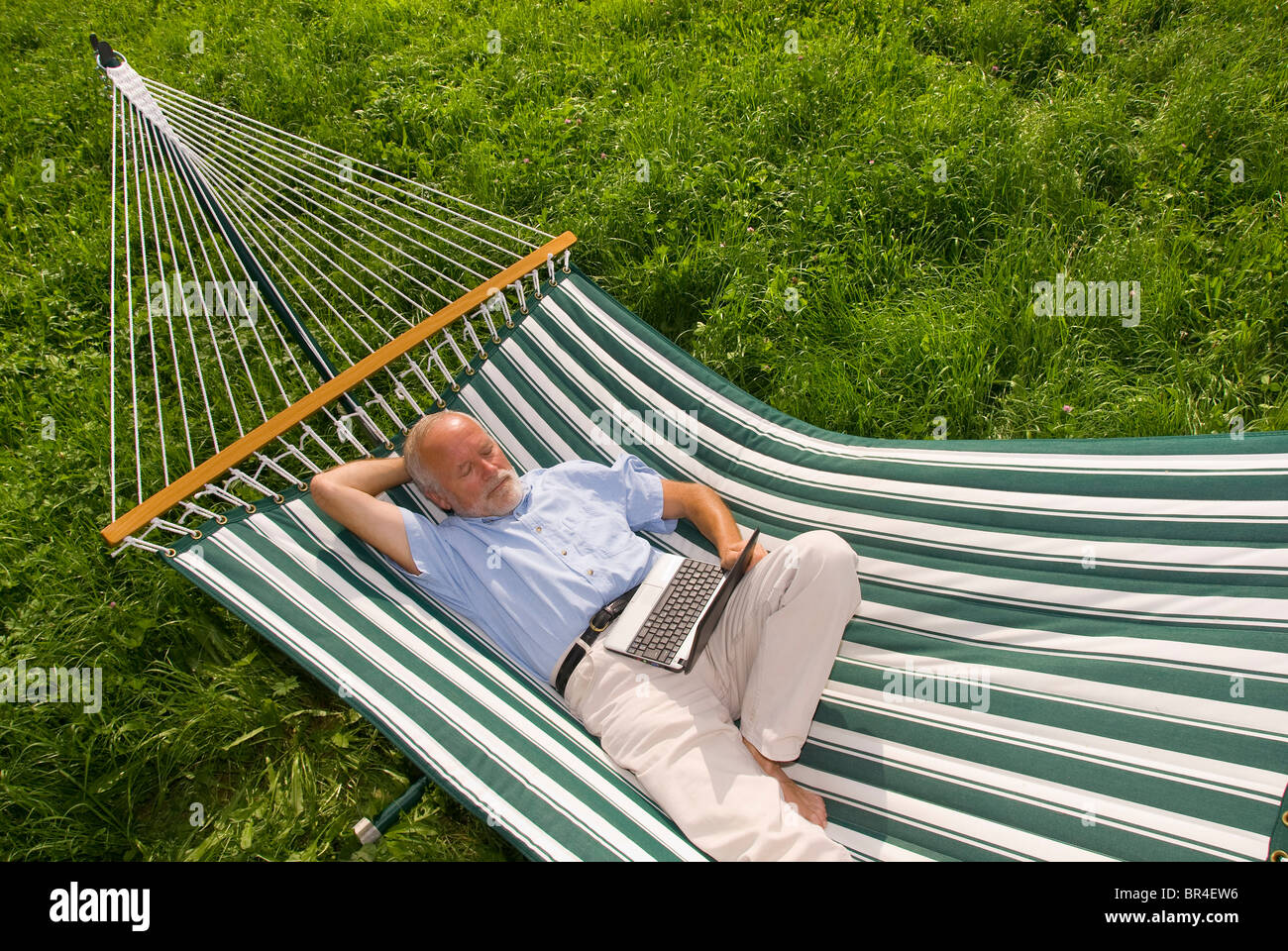Old man in a hammock hi-res stock photography and images - Alamy