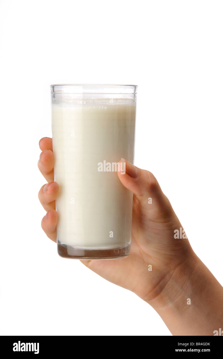 hand holding glass of milk on white background Stock Photo