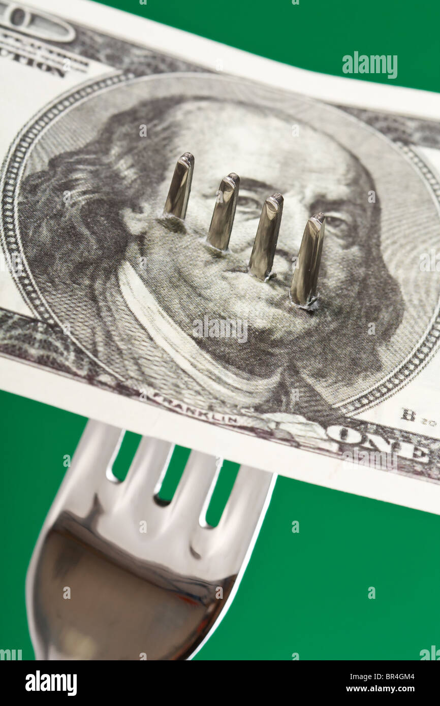 fork with money Stock Photo Alamy