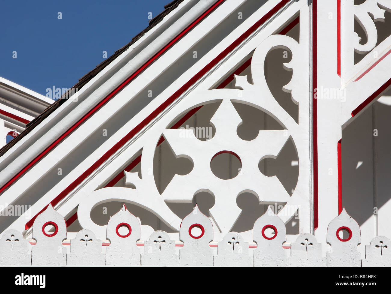 Detailed carving on roof of the Baldwin House at the Los Angeles County Arboretum - Baldwin House - painted white and red Stock Photo
