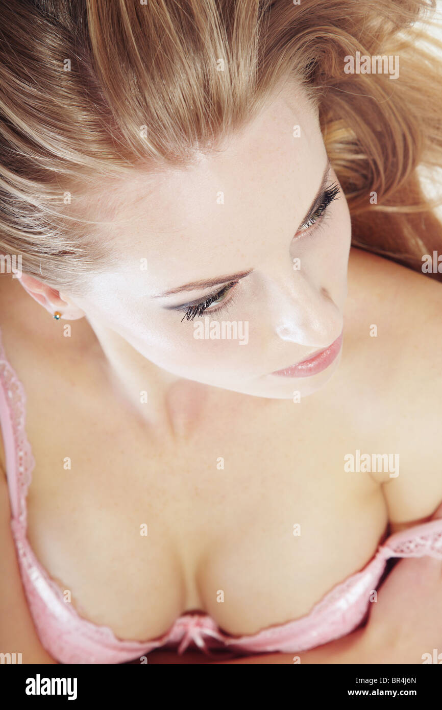 Top view on the nifty blond lady with perfect breast in the pink
