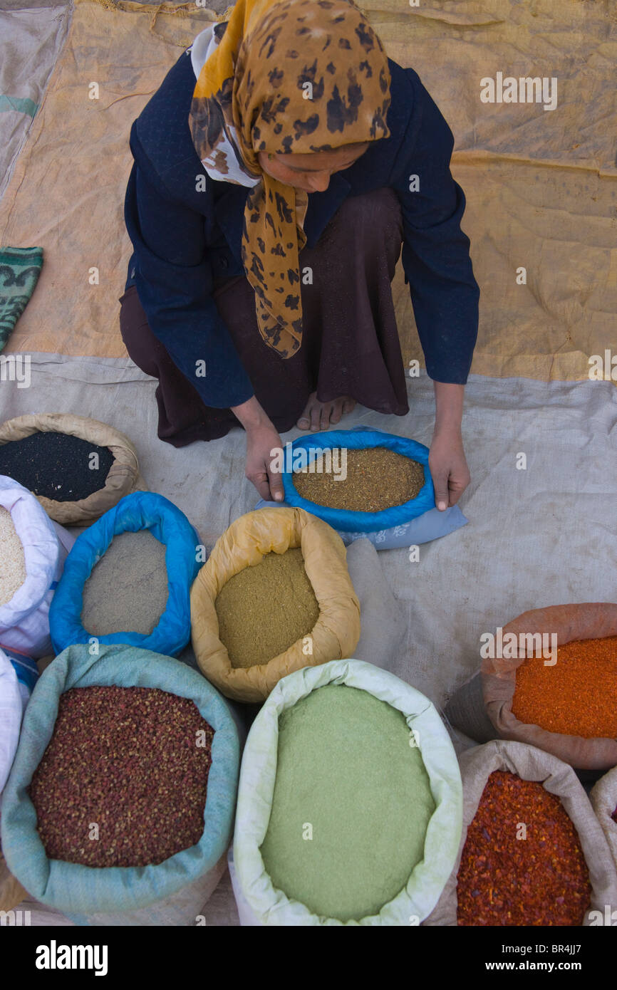 Selling spices at the market, Hotan, Xinjiang, China Stock Photo