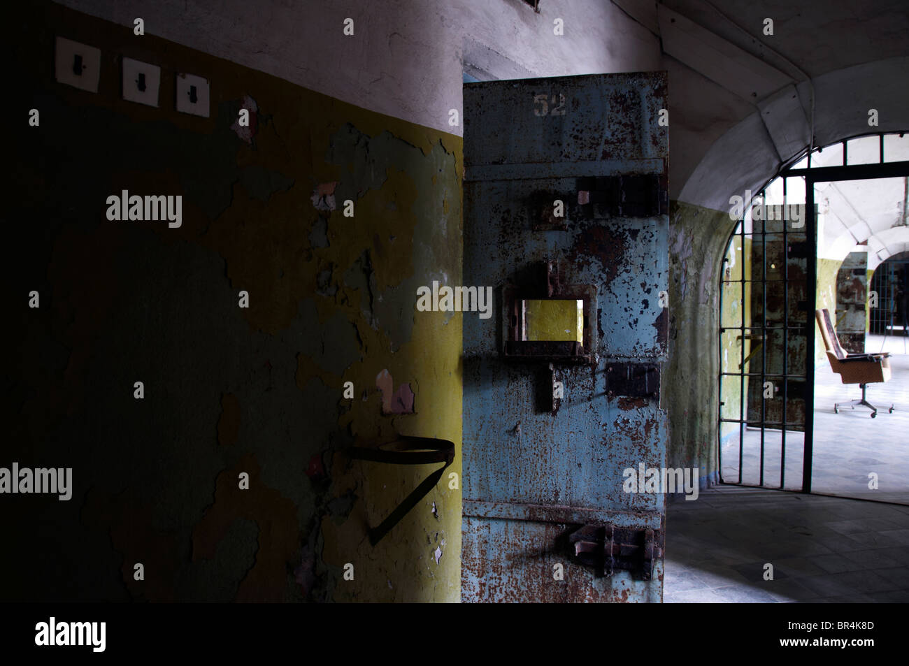 Cell doors in the old abandoned prison Stock Photo