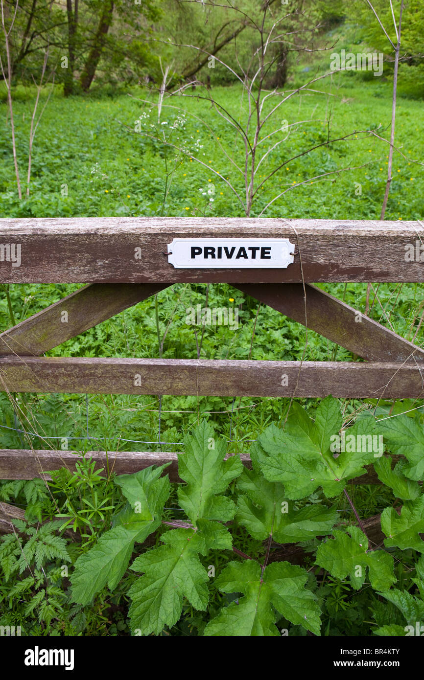Private notice on a gate in the Cotswold village of Kineton, Gloucestershire Stock Photo
