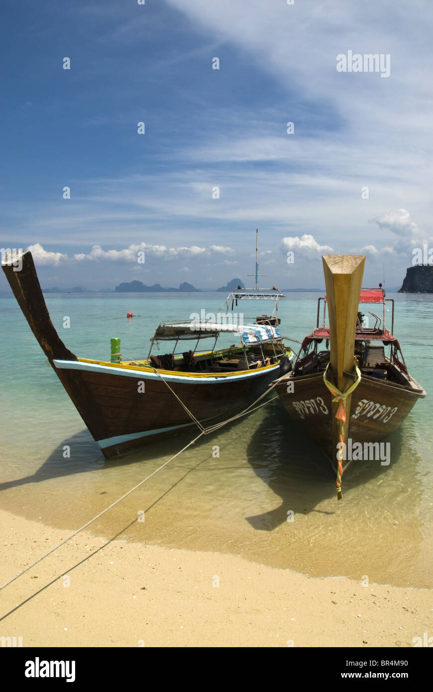 Longtail boats on the beach, Ko Ngai Island, Thailand Stock Photo