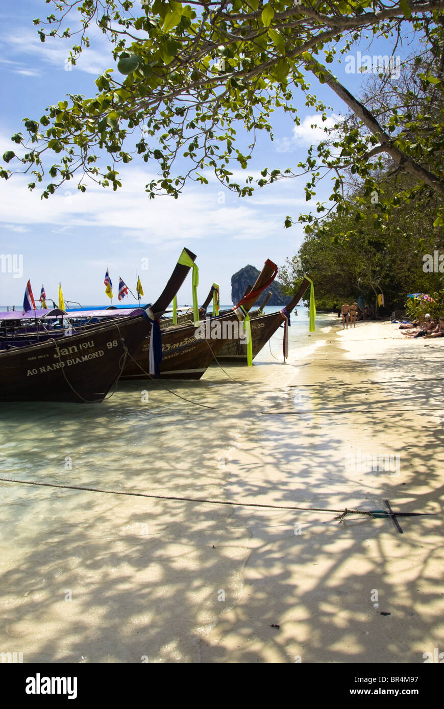 Longtail boats on the beach, Chicken Island, Thailand Stock Photo