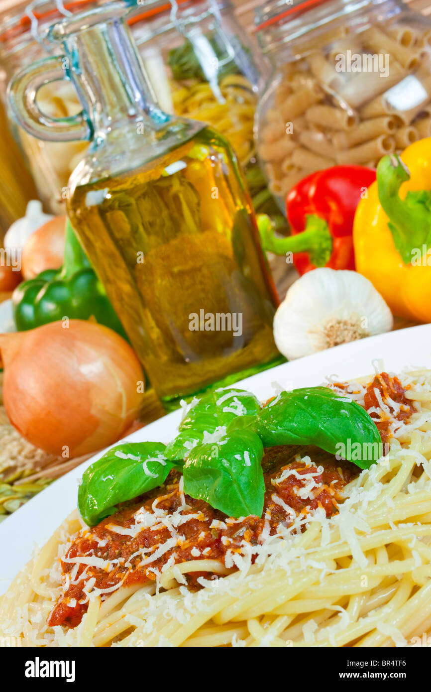 Spaghetti Bolognese with olive oil, Parmesan Cheese, basil garnish