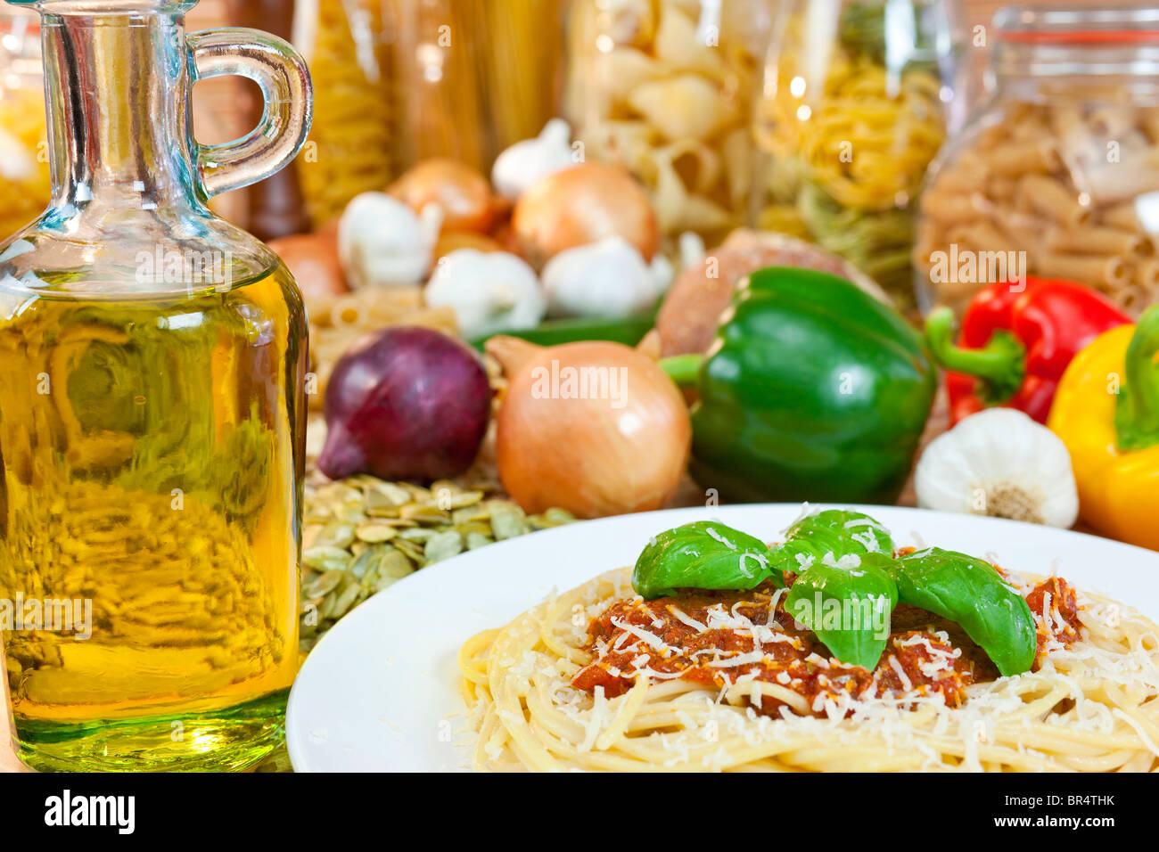 Spaghetti Bolognese with olive oil, Parmesan cheese, basil garnish