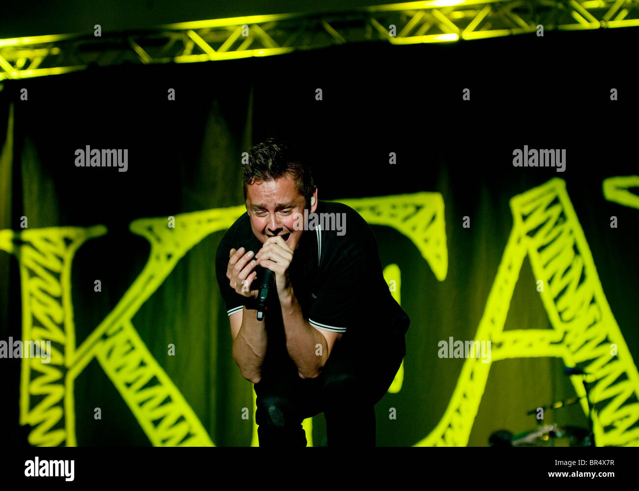 Tom Chaplin, vocalist with British alternative rock band Keane, performing on stage Stock Photo